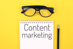 Content marketing written on a notepad