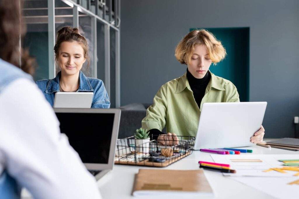 B2B SaaS company employees working on a marketing campaign.