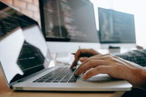 contemporary website developer man typing and writ 2022 10 06 05 58 31 utc scaled